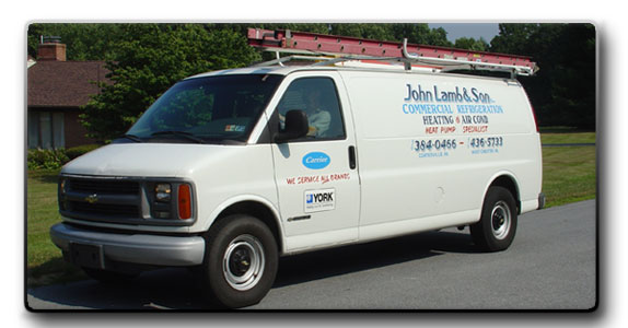 John Lamb & Son team with company service vehicles